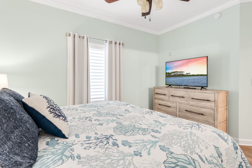 main bedroom with blackout curtains