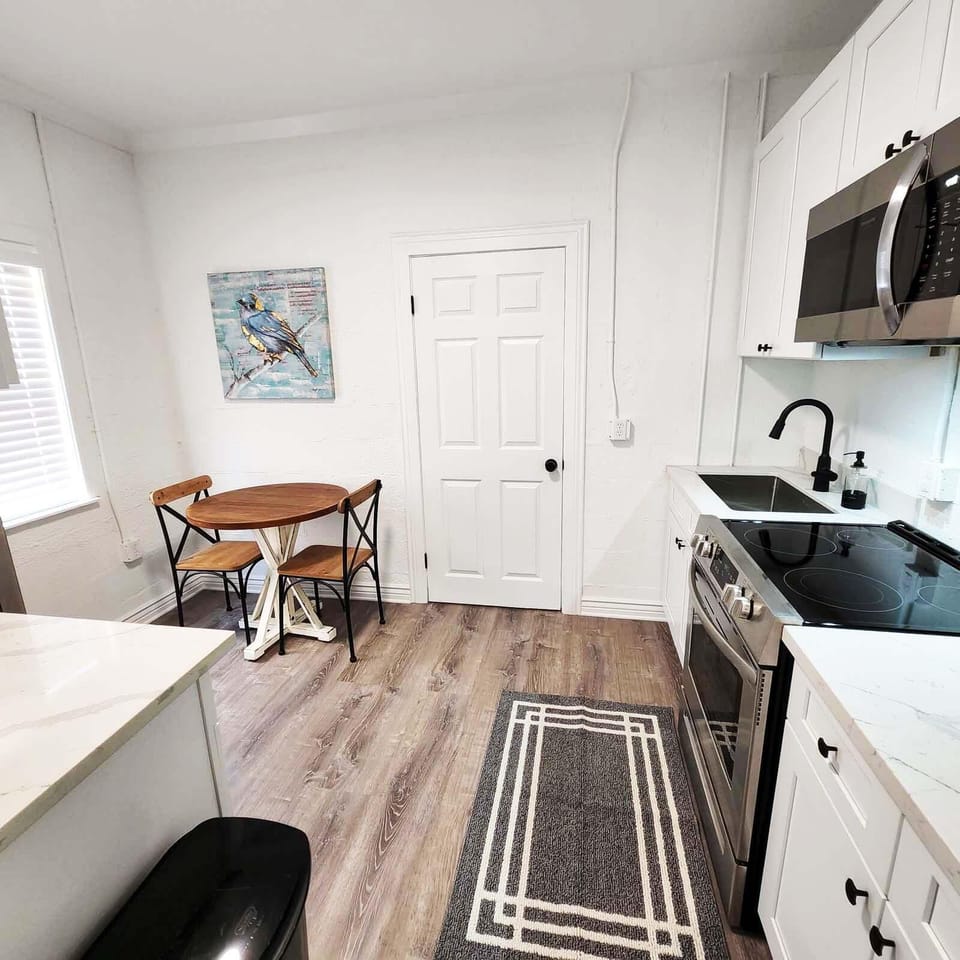 Kitchen &amp; dining area in second room