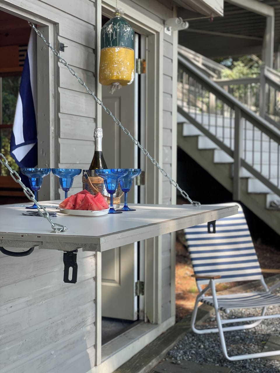 Garden shed that converts to a bar. It even has vine cooler.