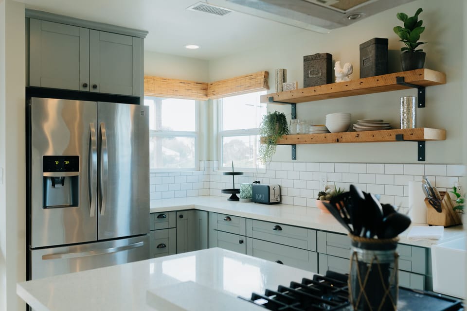 Gas topper stove with smart oven features and new fridge