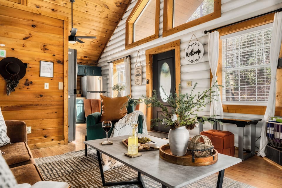 High ceilings with plenty of natural light in this cozy living room. 