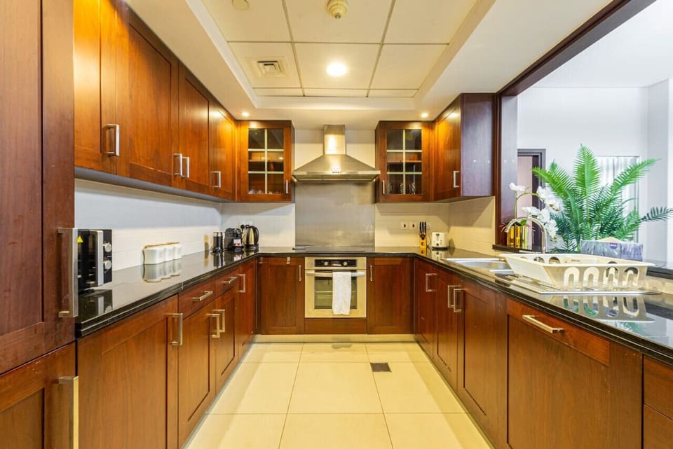 Gourmet Kitchen: Whip up culinary delights with sleek finishes and top-notch appliances!