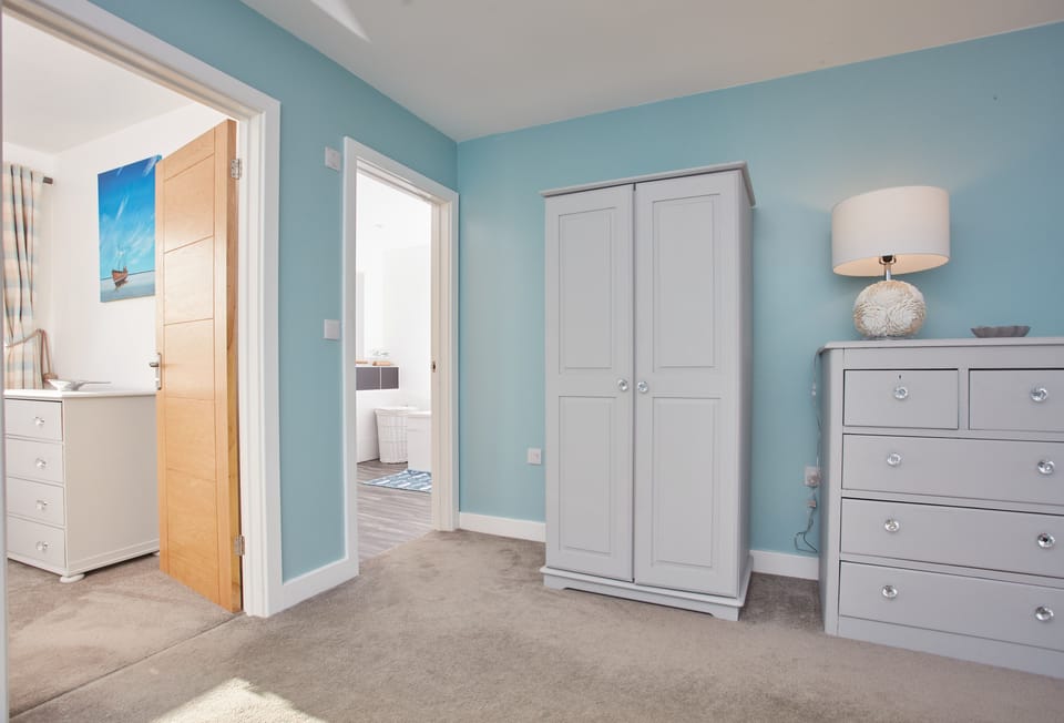 Treveth Lowen, St Minver. Ground floor: Bedroom one with access to bedroom two and the family bathroom