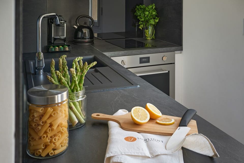 Modern fully equipped kitchen with Nespresso coffee machine