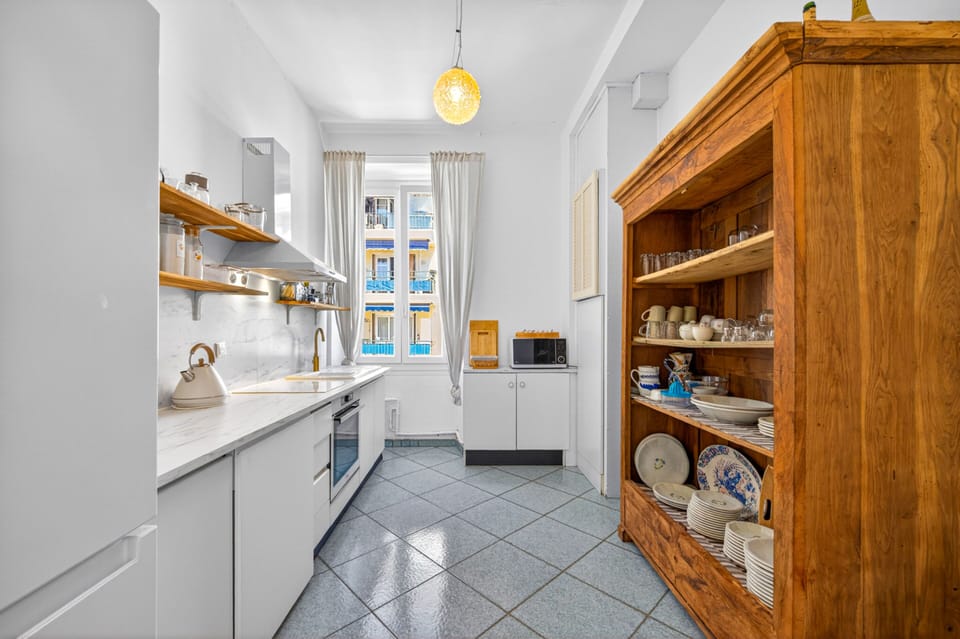 Fully equipped kitchen on the duplex's ground floor, ready to welcome you.