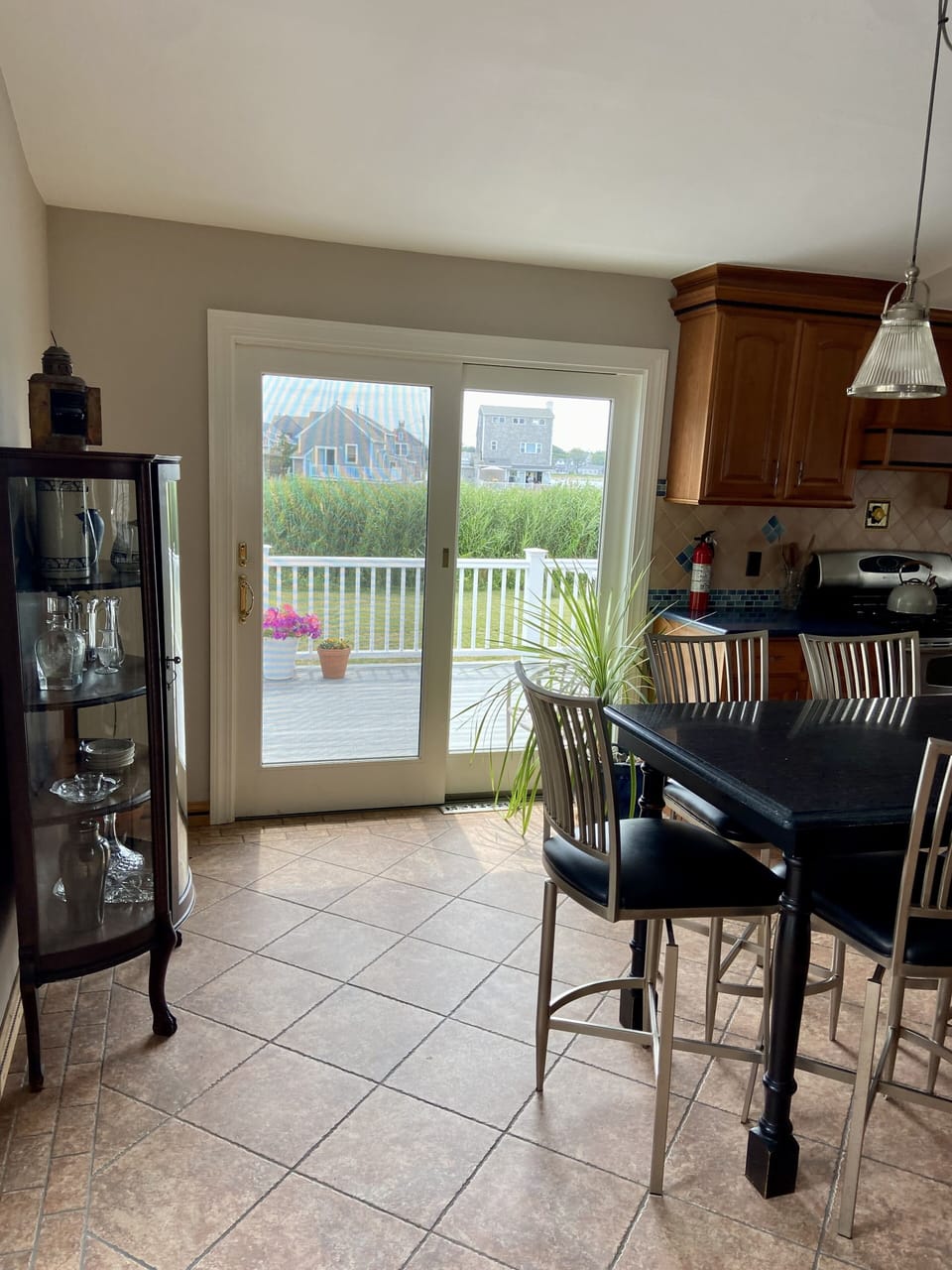 Kitchen fully equipped with Crate&Barrel dishes, serving ware for gatherings.