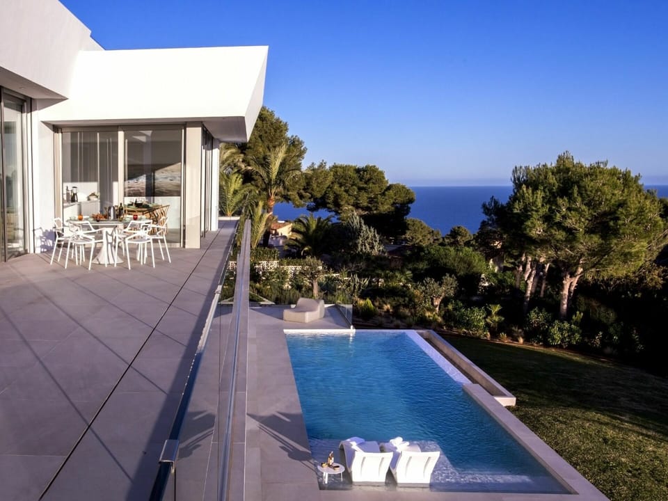 Sky, Building, Property, Plant, Shade, Tree, Outdoor Furniture, Swimming Pool, Architecture, House