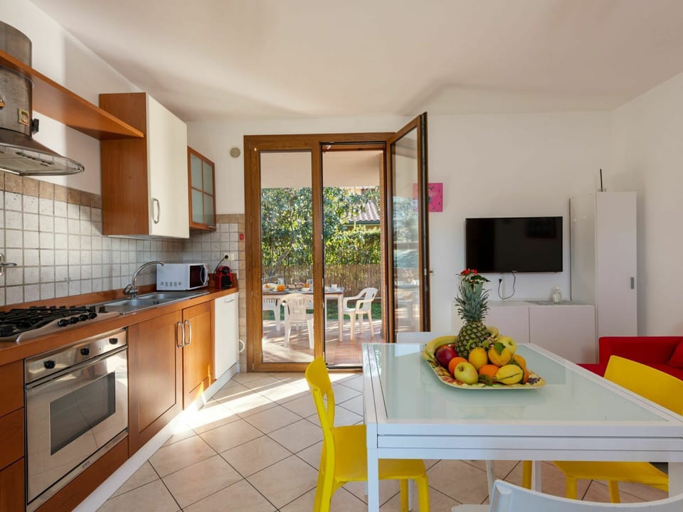 Countertop, Cabinetry, Furniture, Table, Kitchen, Home Appliance, Kitchen Appliance, Kitchen Sink, Kitchen Stove, Wood