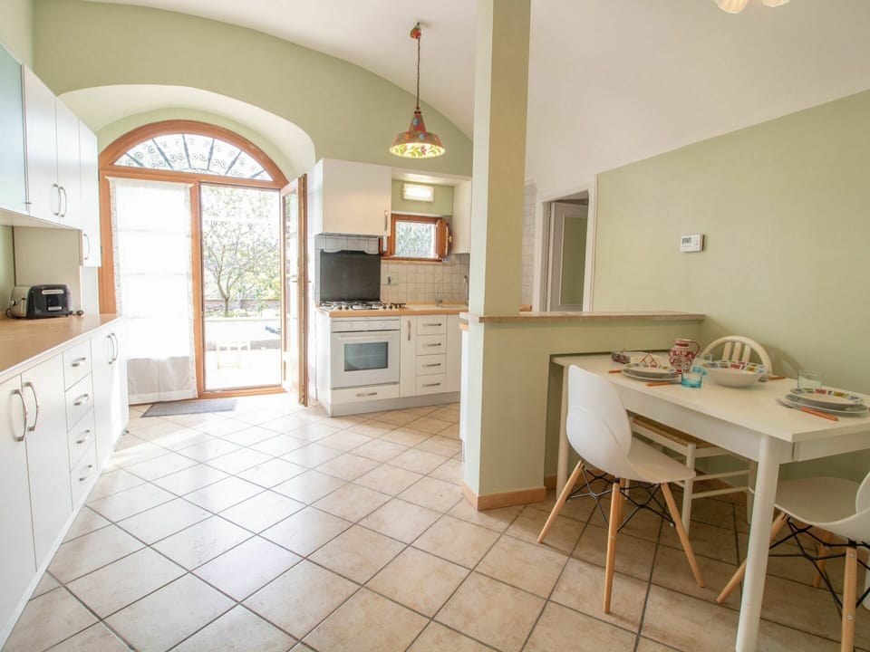 Cabinetry, Furniture, Property, Table, Countertop, Chair, Wood, Window, Interior Design, Kitchen