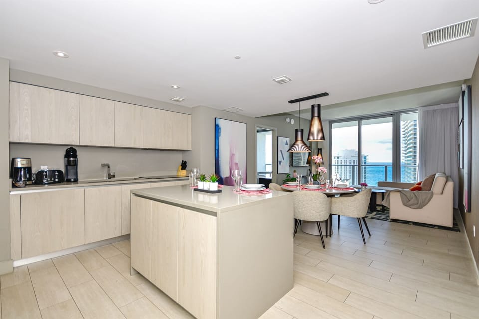 Kitchen, dining and living room with a terrace/balcony