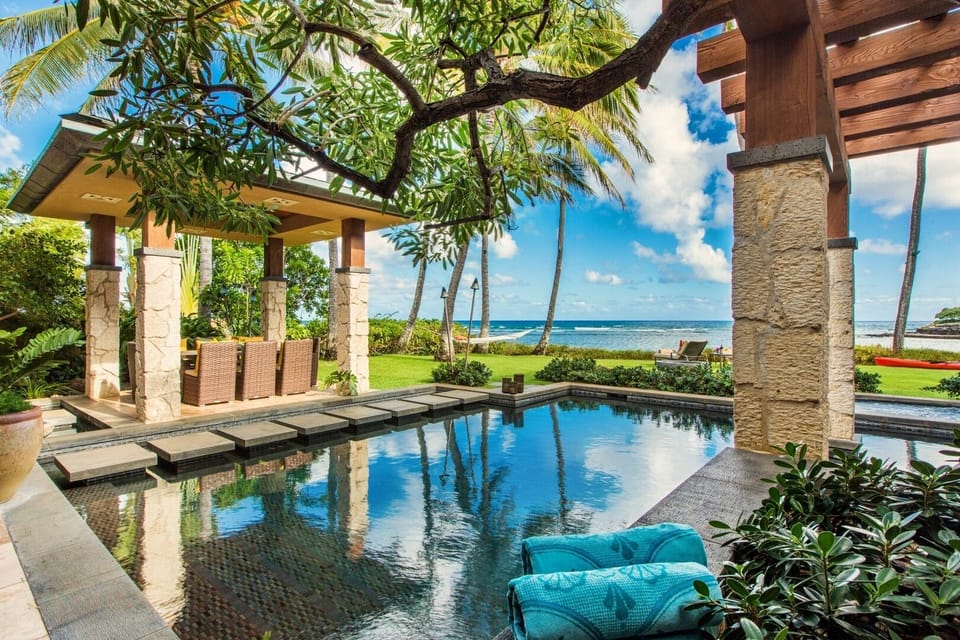 Spend the day by the private pool and cabana, surrounded by tropical landscaping and Pacific views.
