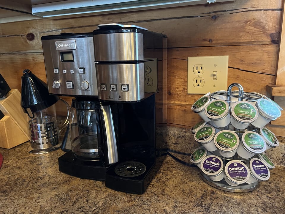 Coffee pods and regular grounds provided!