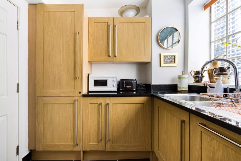 Kitchen — fully equipped and includes a washer/dryer.