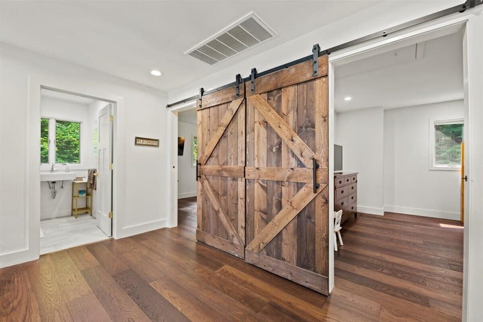 Upstairs landing with an office desk - overlooking the woods and the lake
