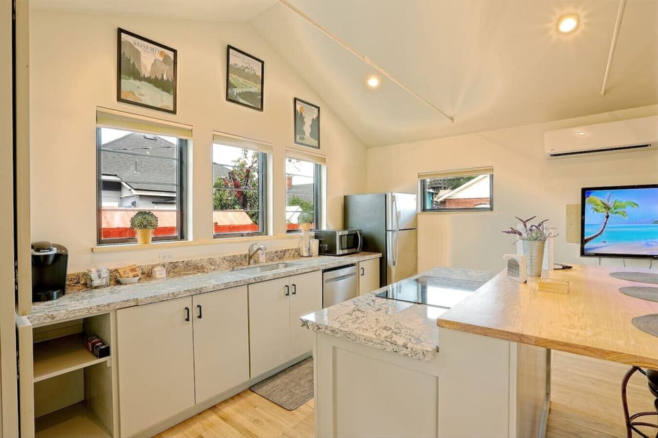 Bright, open kitchen with everything you need to cook and enjoy meals at home.