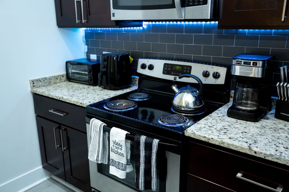 Enjoy a Lighted, fully equipped kitchen with Gourmet Air Fryer and Toaster Oven!