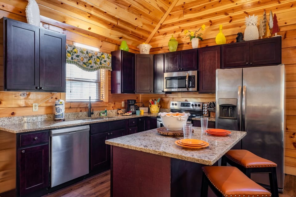 Full kitchen with granite island — built for group meals