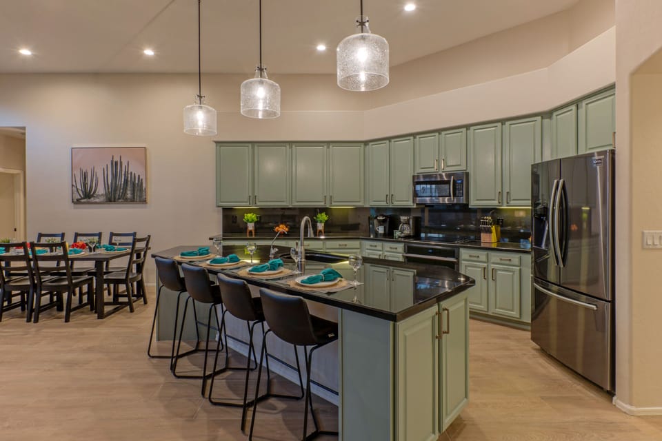 The well stocked kitchen has counter space to prep and serve healthy, home-cooked meals.