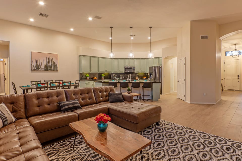Relax with a good book or friend on the comfy sectional sofa in the great room.