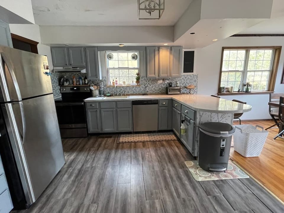 Modern, stainless steel fully stocked kitchen