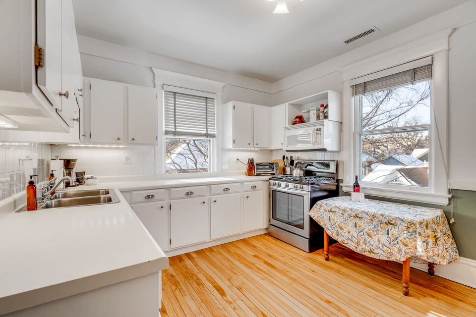 The kitchen has a small breakfast table as additional serving space or a meal with just a few friends