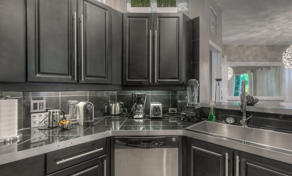Cook with style in our villa's sleek kitchen, with stainless steel appliances.