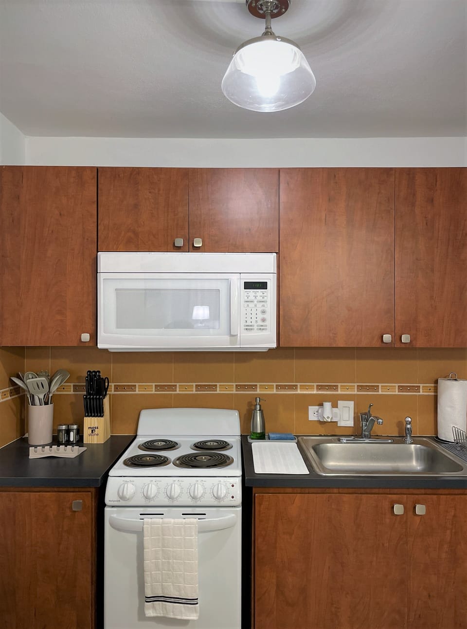 The kitchen contains brand new appliances and is fully equipped.