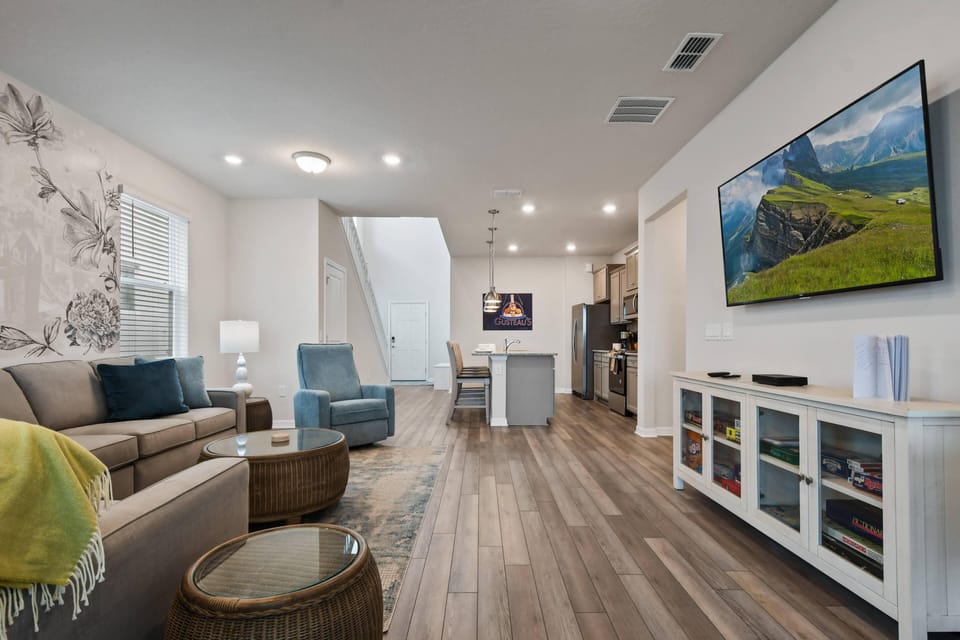 Amazing Living Room Area with Tinkerbell Decor and Flat Screen TV