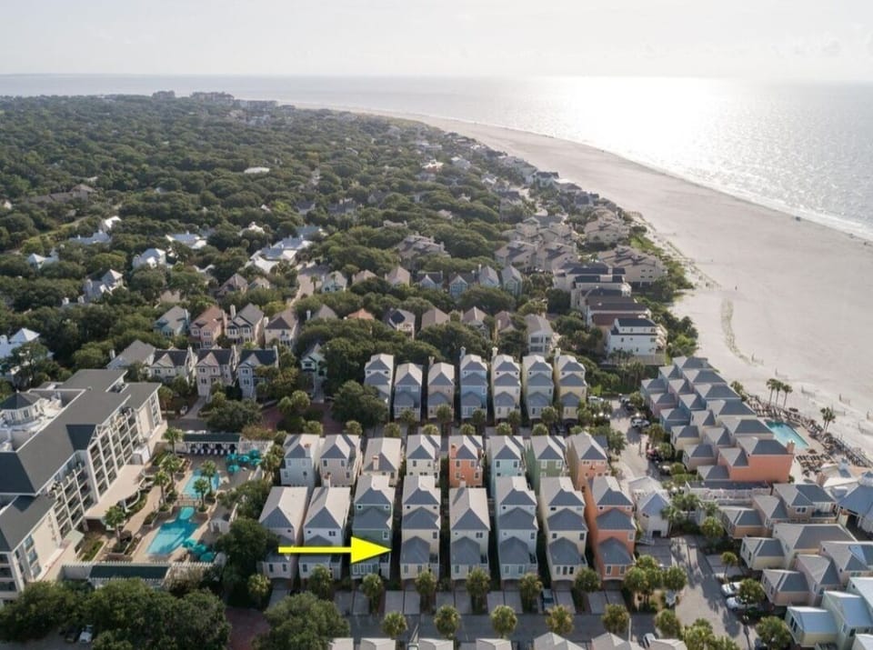 Areal view of home in proximity to the Grand Pavilion amenities and beach