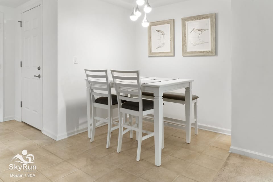 Dining area seats four (4) comfortably.