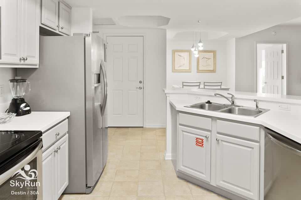 KItchen has white cabinets.