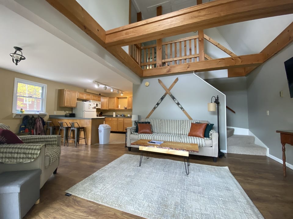 Living room with vaulted ceiling