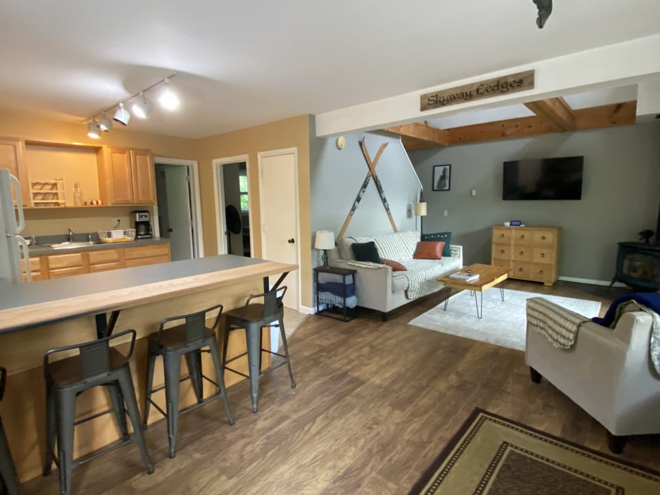 Living room and kitchen with breakfast bar
