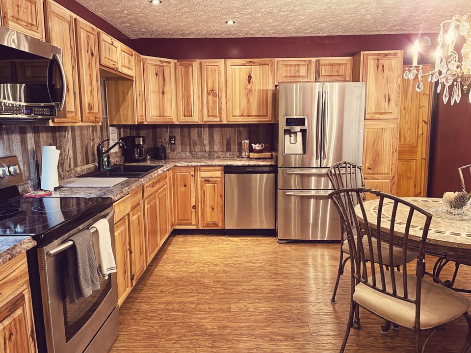 Fully stocked kitchen with additional seating 