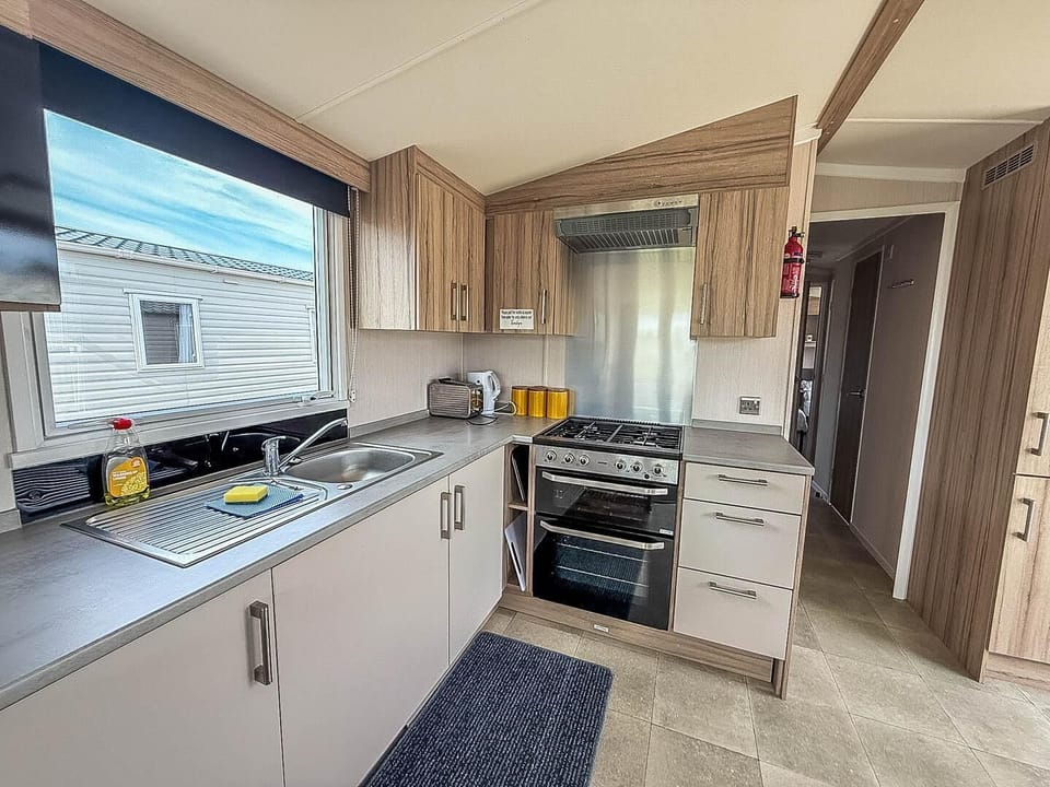 Bright modern kitchen with all appliances