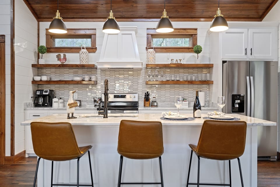 Kitchen Oasis: Enjoy gourmet meals in this stylish kitchen with modern finishes and inviting vibes!