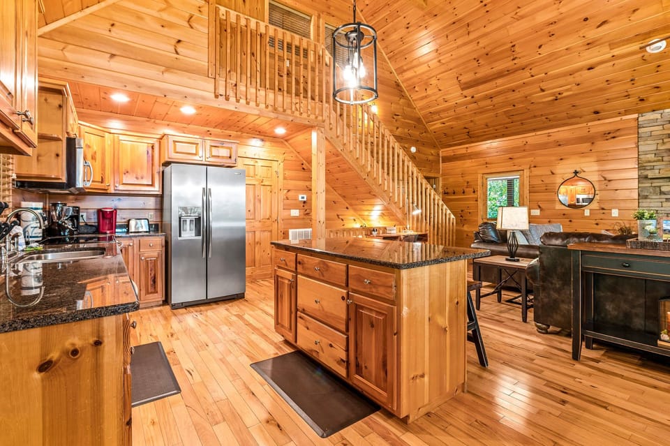 Fully Stocked Kitchen with plenty of counter space, including a large island.  Starter paper towel, dish soap, dishwasher pods are provided. Please bring your own coffee, filters and cream/sug