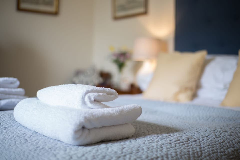 Fluffy White towels and Crisp white bedlinen