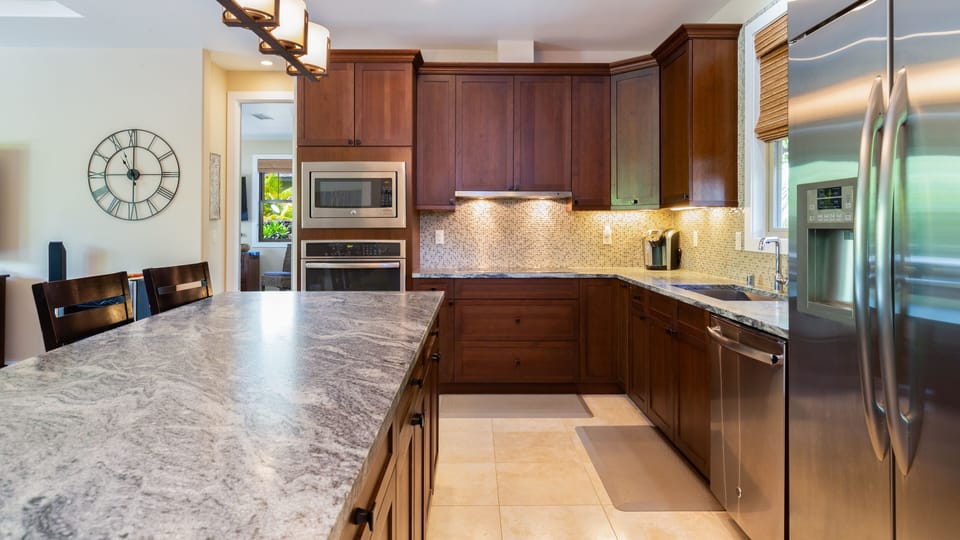 Gourmet kitchen Stocked with spices, oils and cookware essentials