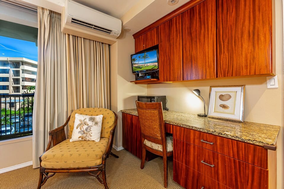 Enjoy the comfort of having the microwave in this bedroom