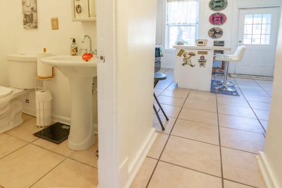 This clean and bright bathroom is just steps away from the heart of the home. #cleanstay 
