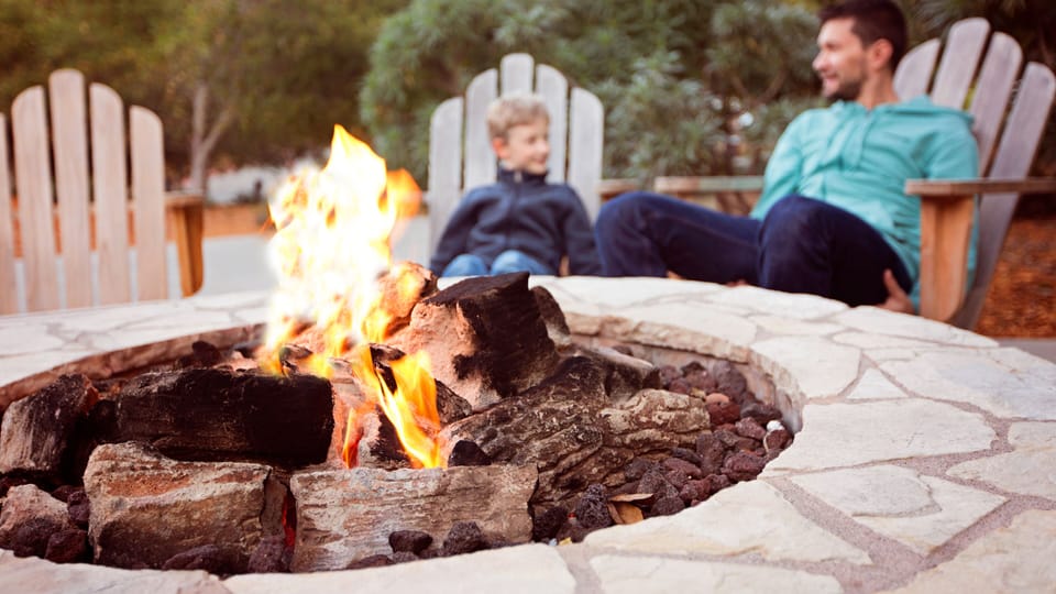 Gather around the fire with family and  friends at your rentals’ fire pit.