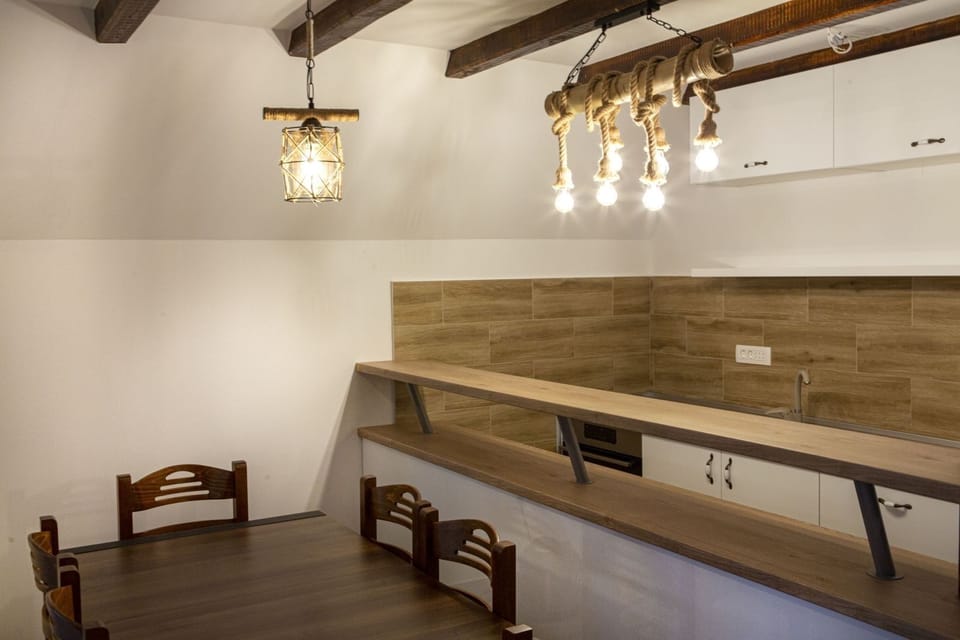 Bar table would be a great spot for you if you want to enjoy glass of vine