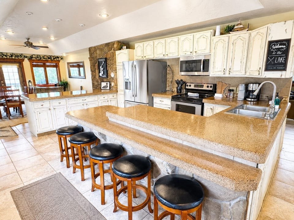 Main house kitchen with full appliance and kitchen supplies