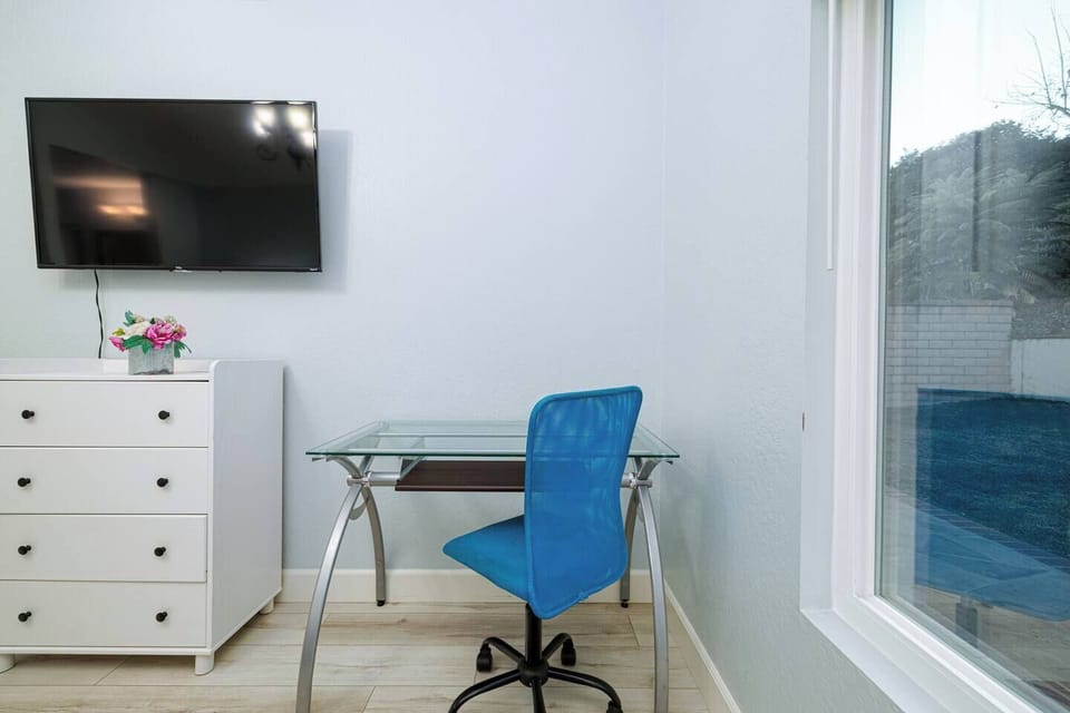 TV & computer desk/chair in master bedroom
