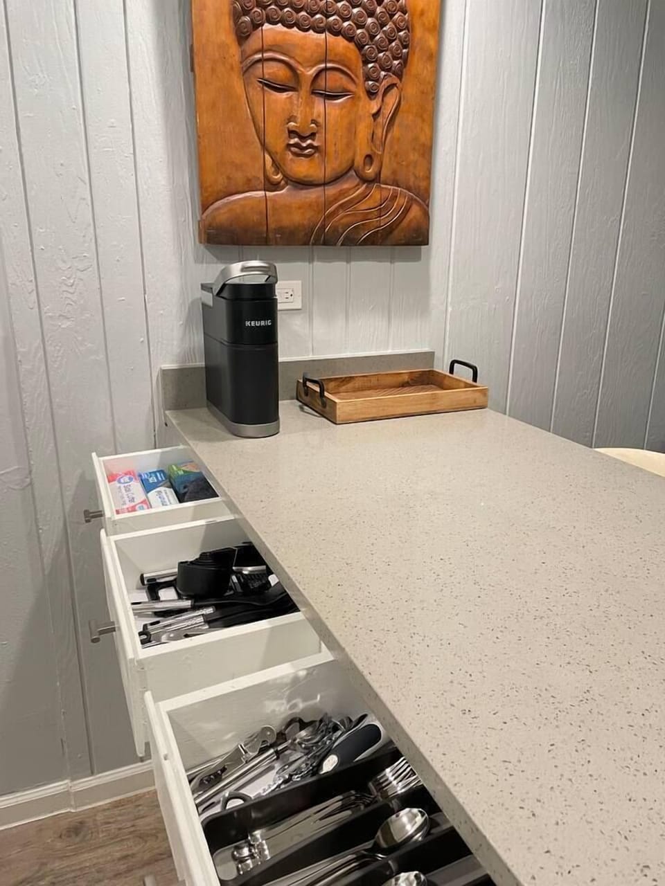 Fully stocked kitchen - equipped with Keurig, coffee pods, French Press, microwave, toaster oven, blender, Brita water pitcher and full set of cookware and dinnerware. 