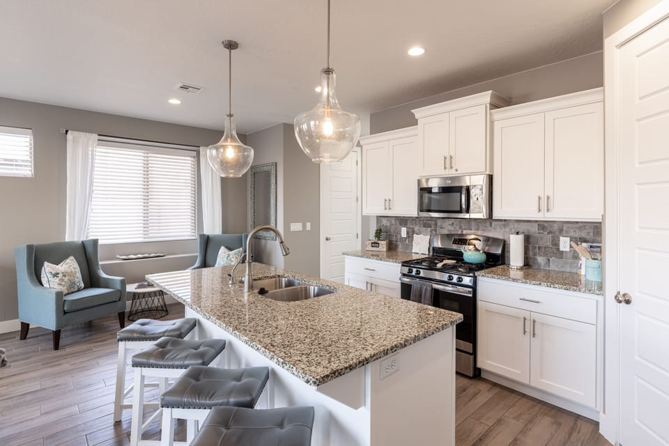 Kitchen Island - The Kitchen Island comfortably seats 4 adults and creates a great space for serving and preparing meals.