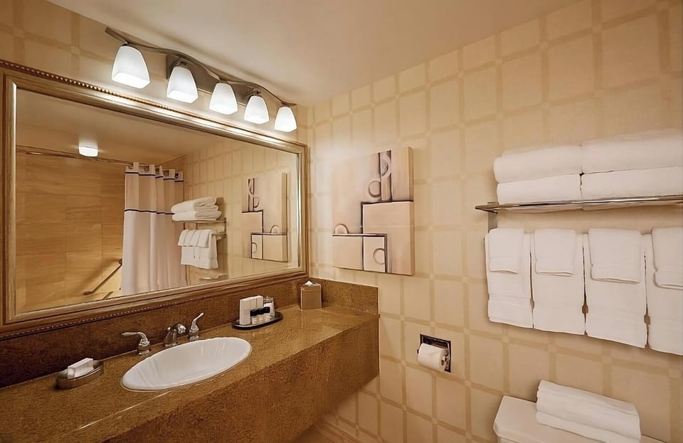 Refresh easily with a spacious vanity and fluffy towels.