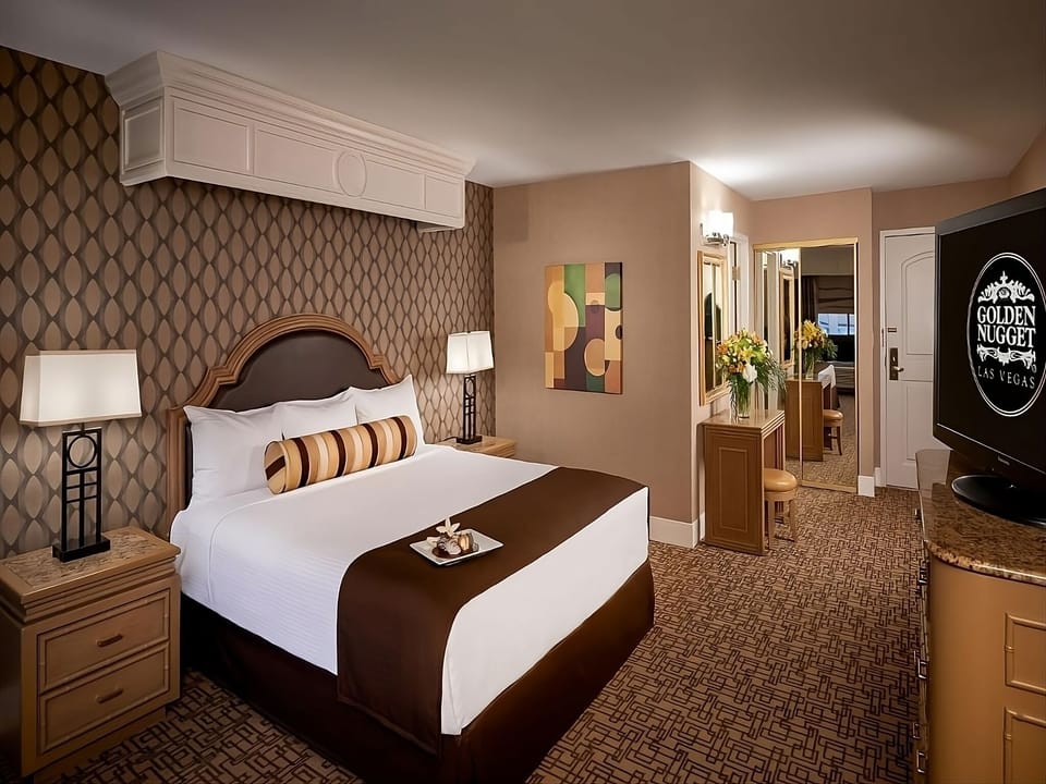 Unwind on a plush king bed after lively evenings.