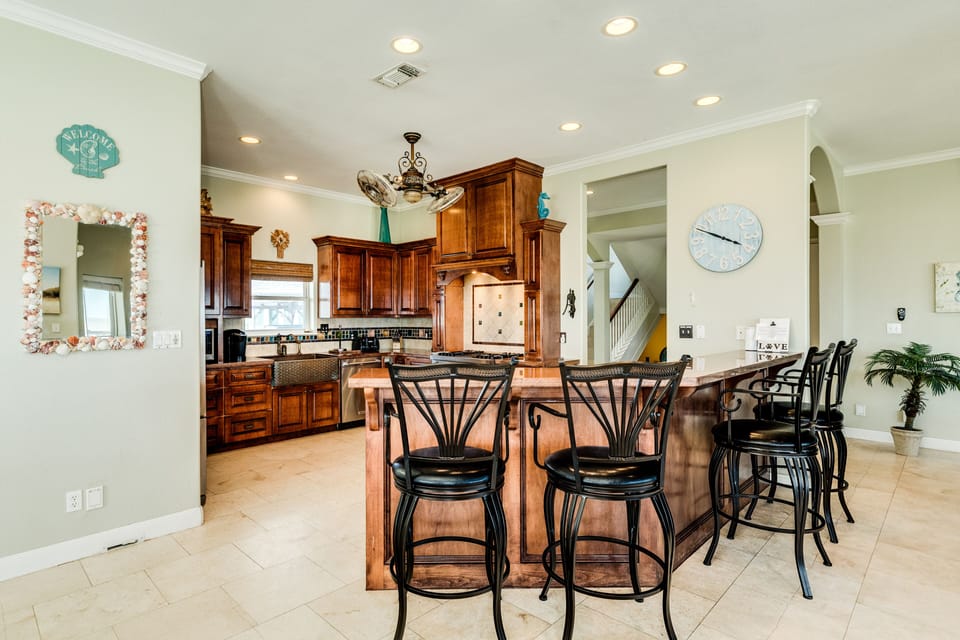 Watch the family cook in action from the breakfast bar seats